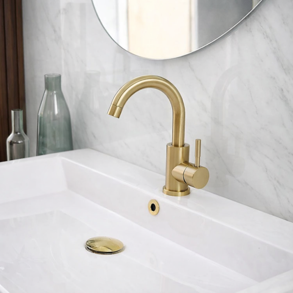 Auréa Curve – Mitigeur lavabo dorée design à bec courbé