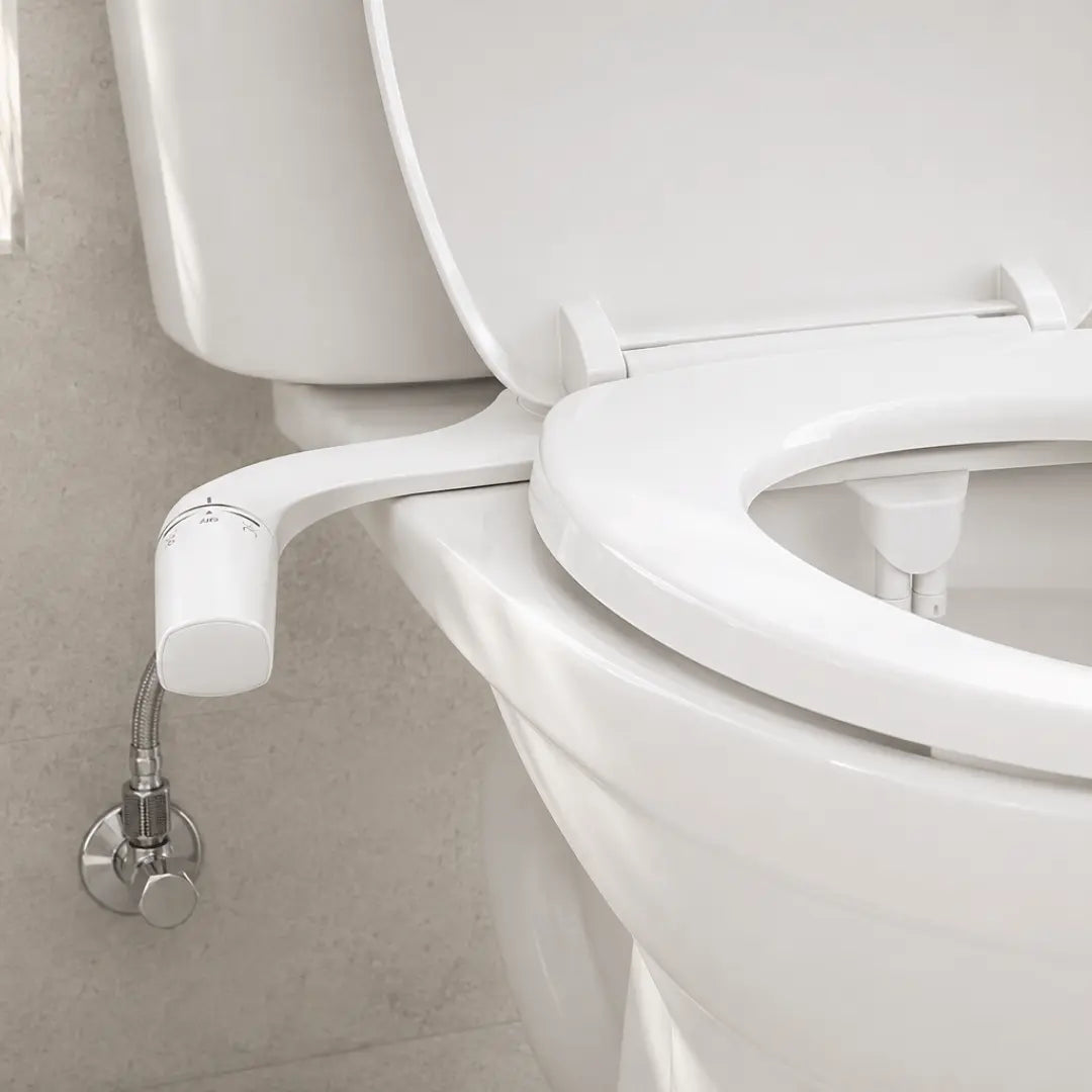 Kit WC japonais Purea Wash installé sous l’abattant avec raccordement à l’arrivée d’eau